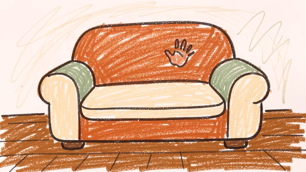 A child's crayon drawing of an open hand held up flat, drawn with thick waxy crayons